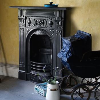 black Victorian fireplace in period room