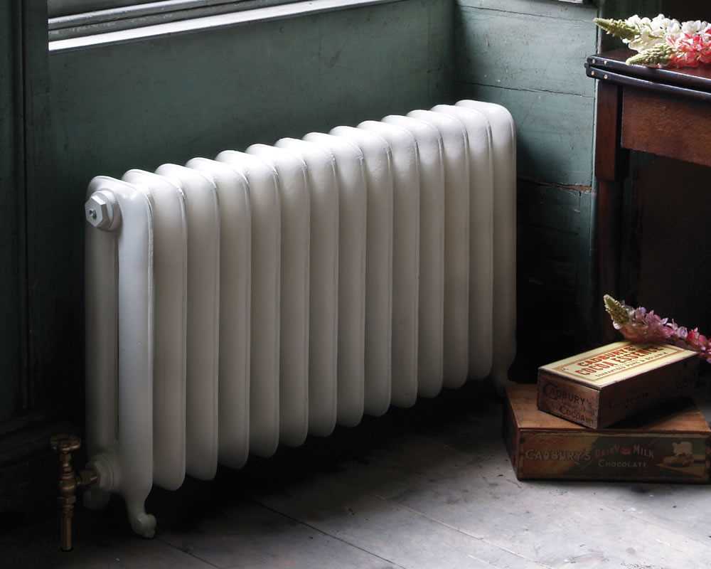 Duchess cast iron radiator painted in parchment white