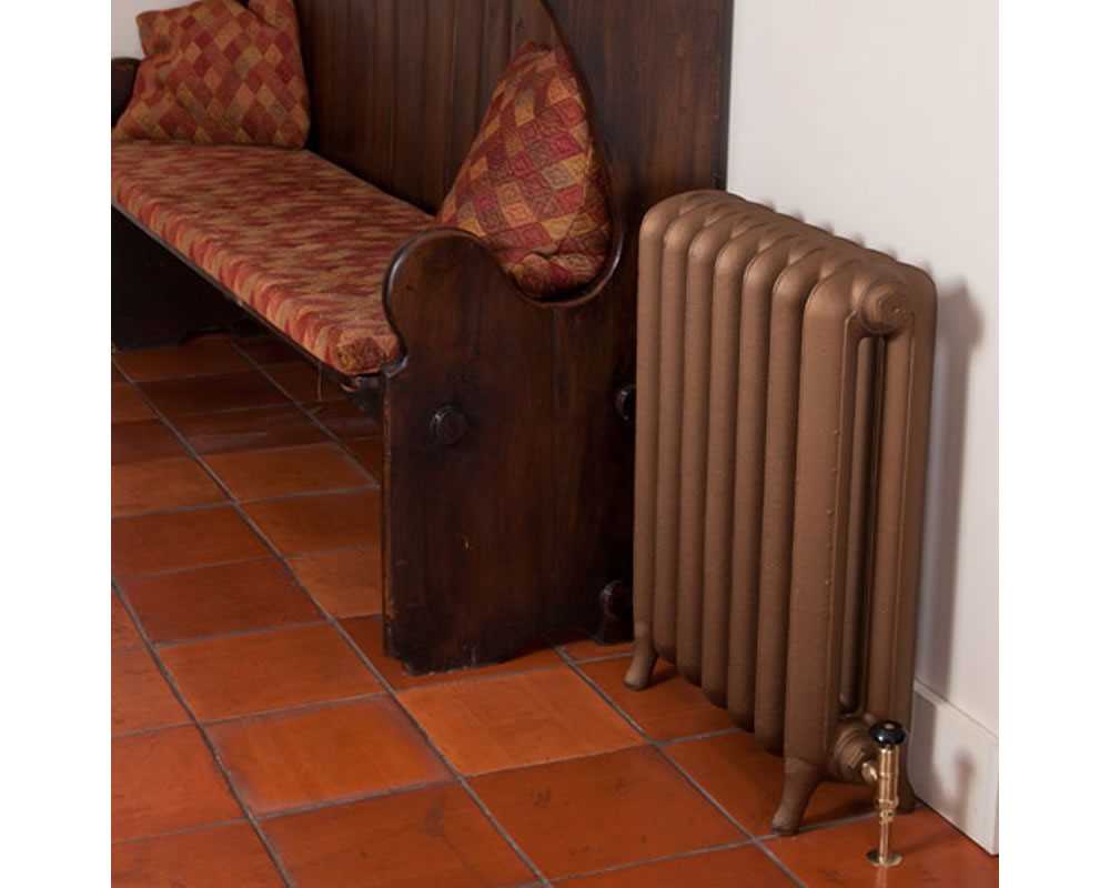 Peerless cast iron radiator with brass valve in period property
