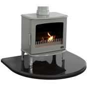 black granite curved stove hearth with sage green stove